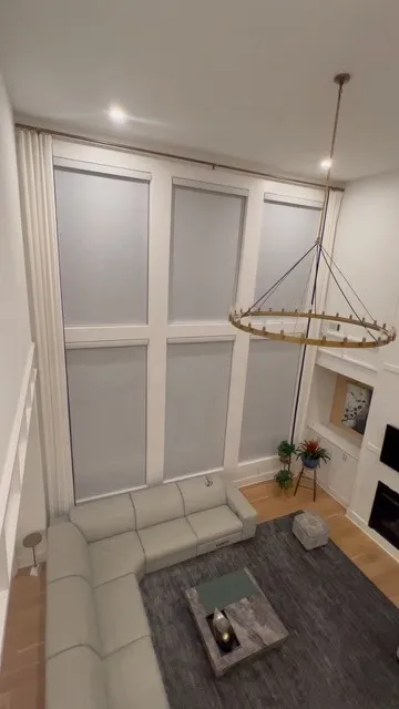 Motorized shades for high & two-story windows